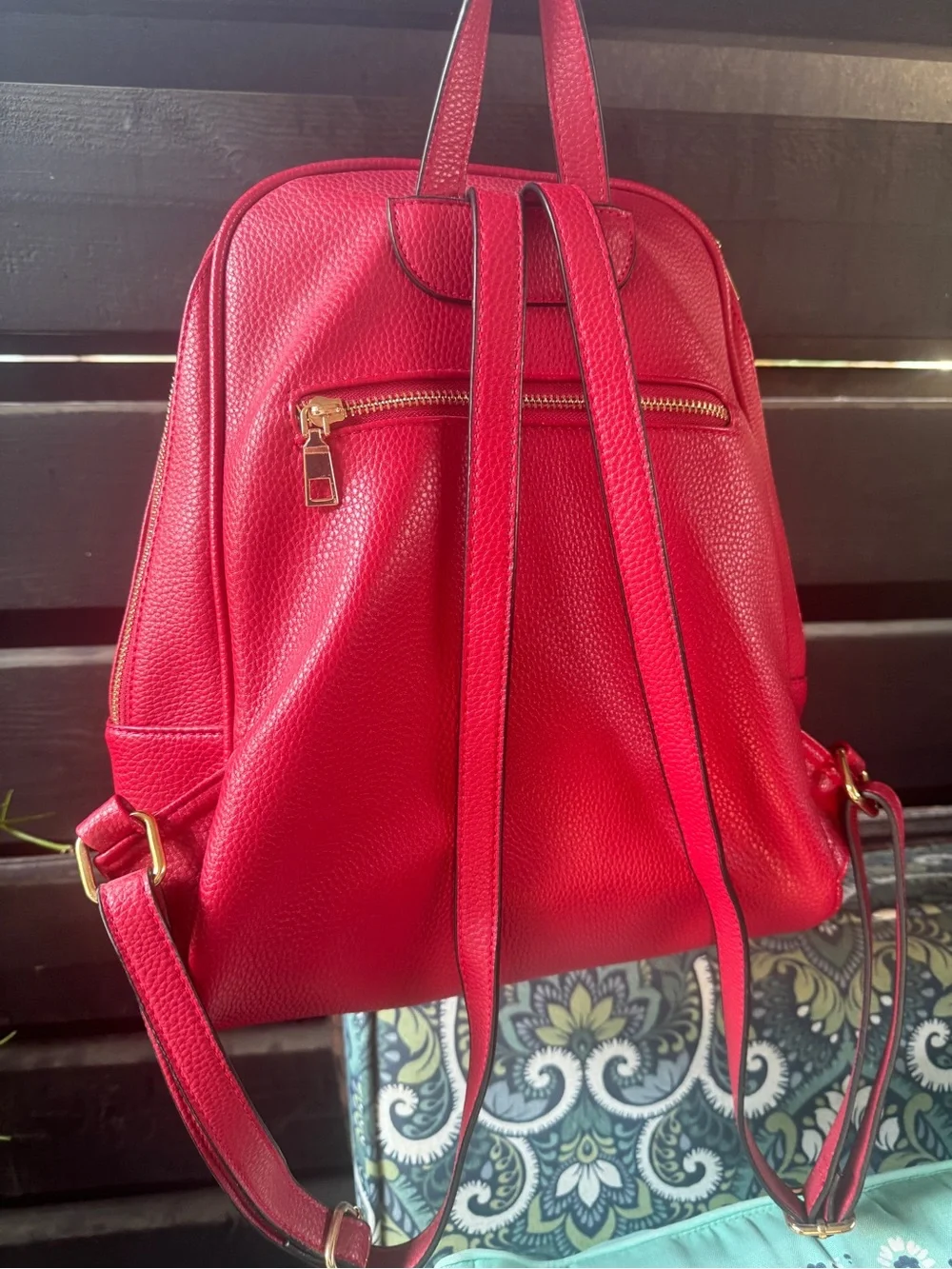 Pebbled Red Women's Leather (?) Backpack with Gold Hardware